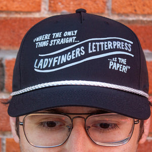 Ladyfingers Letterpress "Where the only thing straight is the paper" Golf Rope Cap