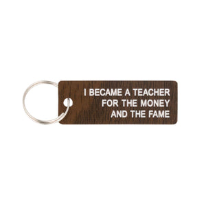 Money and Fame Keychain by About Face Designs, Inc.