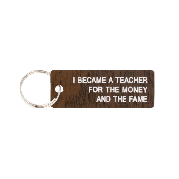 Money and Fame Keychain by About Face Designs, Inc.